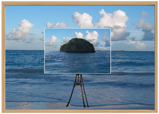 Opera fotografica di arte contemporanea / Contemporary art photo by Norma Picciotto – collage digitale surreale con isola su cavalletto in spiaggia al tramonto / surreal digital collage with island on easel on a sunset beach.